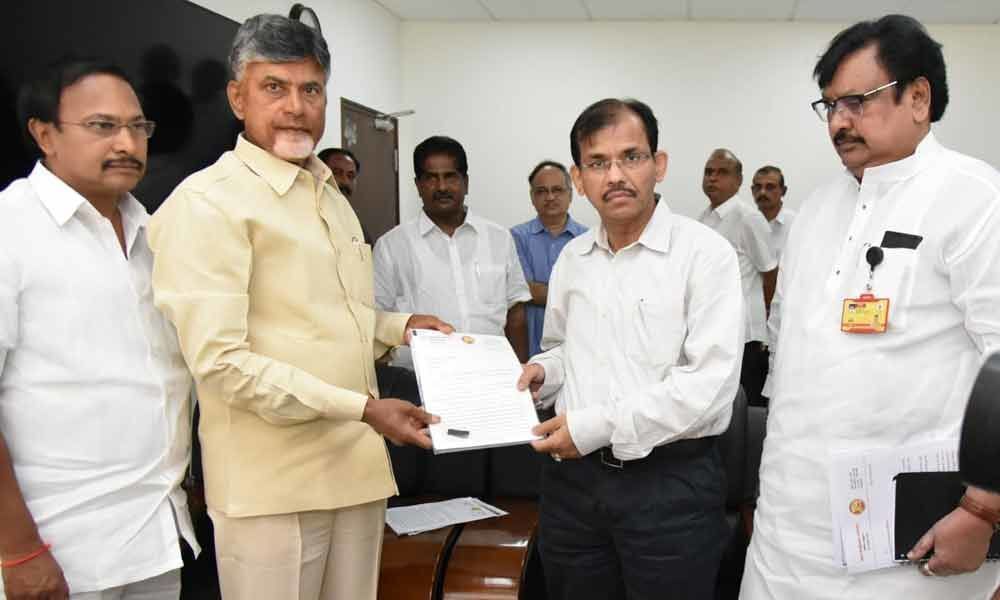 CM Chandrababu Naidu holds dharna in front of AP CEO office