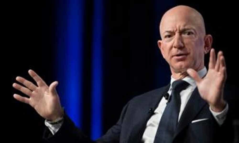 Walmart responds to Bezos with tweet asking Amazon to pay taxes