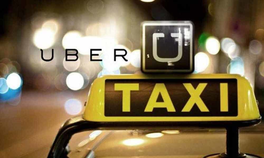 Uber to go public, warns may never make profits