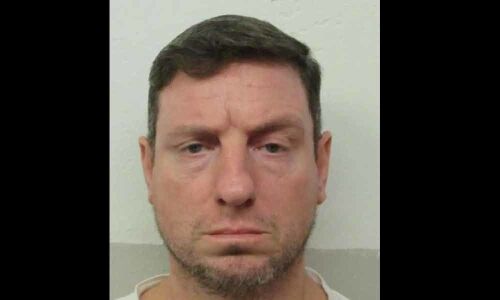 Fighting clock, Alabama halts execution for evening