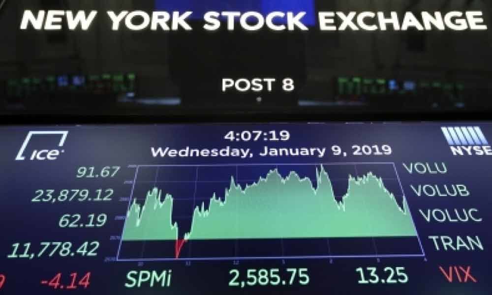 US stocks close higher on upbeat corporate earnings