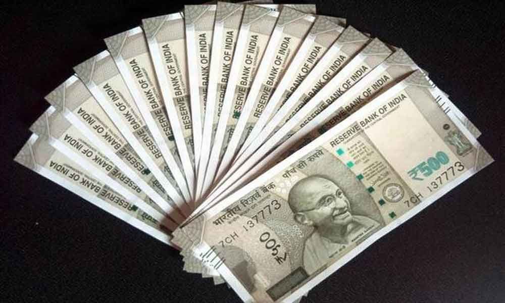 Rupee slips 7 paise to 69.24 vs USD in early trade