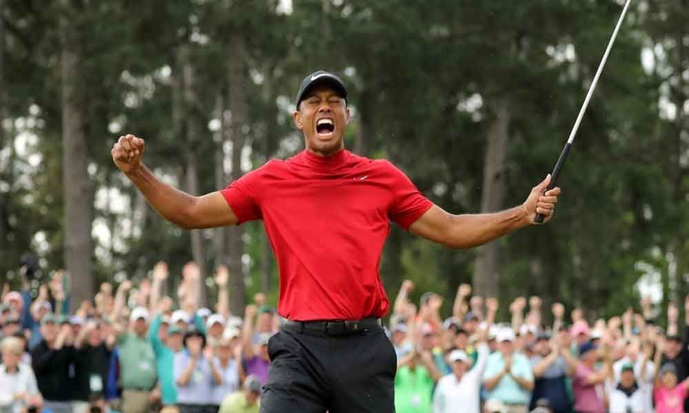 Golf: Woods wins Masters to claim the first major in 11 years