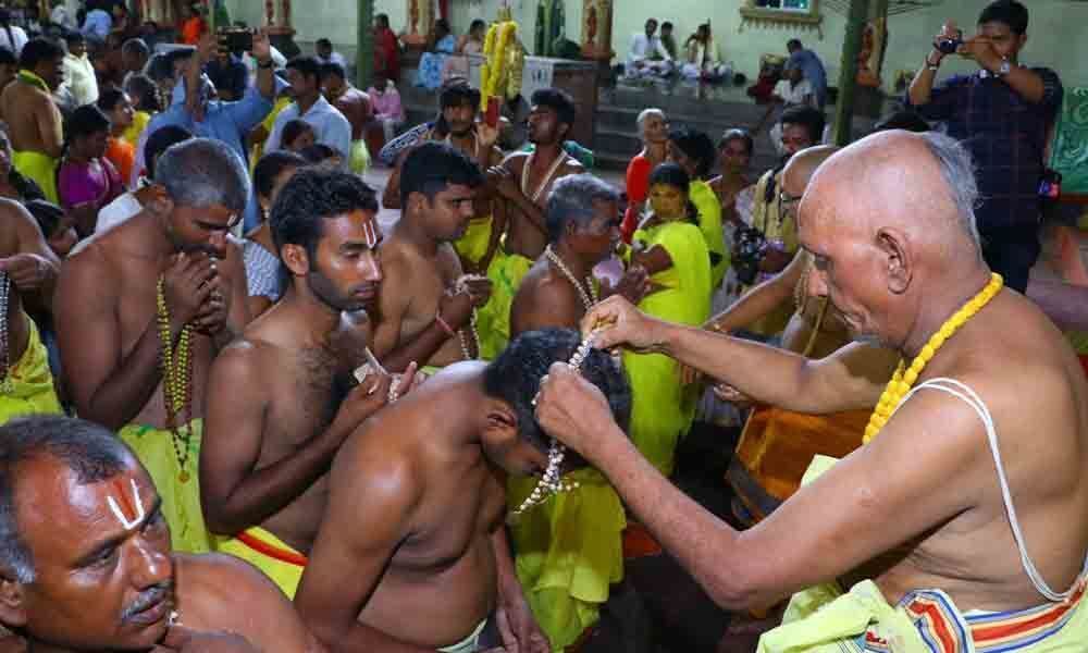 Devotees take Srirama deeksha