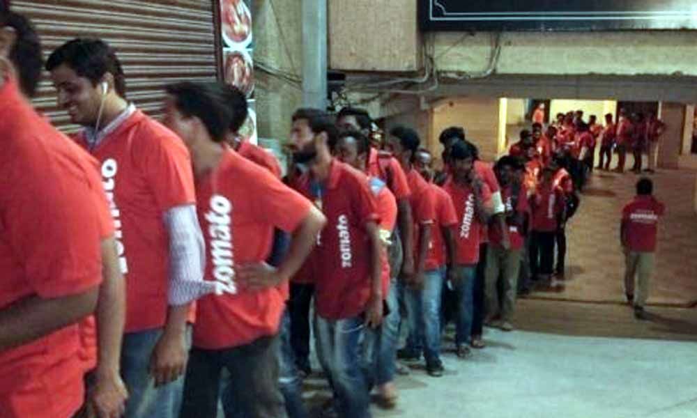 The photo of the Zomato boys in a long queue outside the Hyderabad restaurant goes viral. Because nothing like biryani!