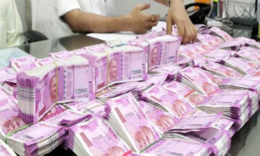 Bundles of cash seized from a shop in TN, police open fire to disperse AMMK cadres