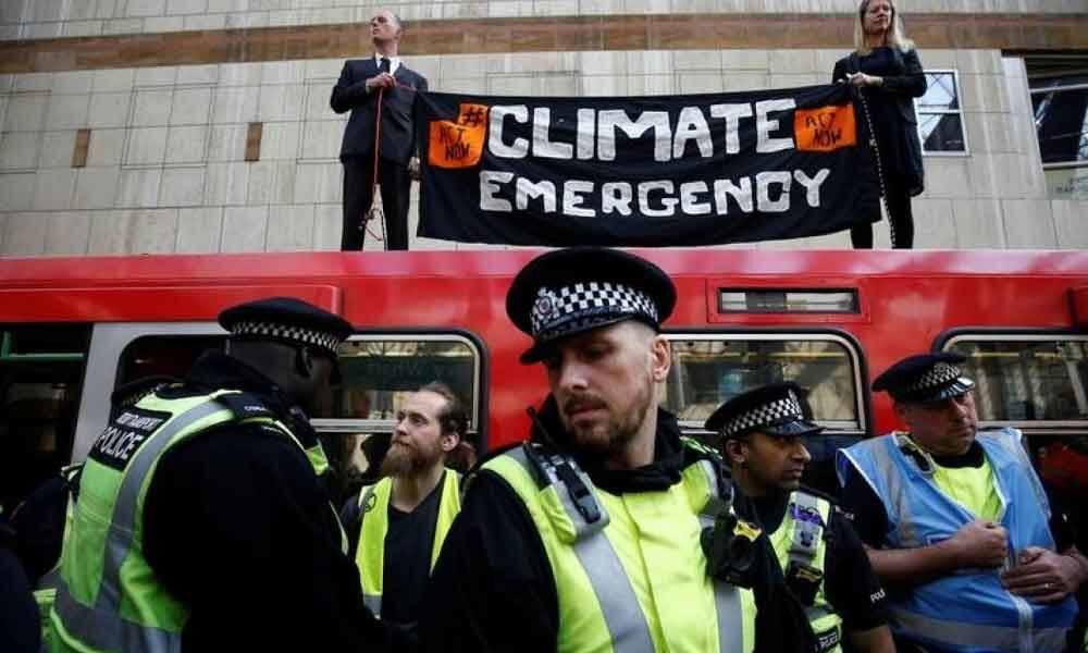 Climate-change protesters disrupt London docklands train service