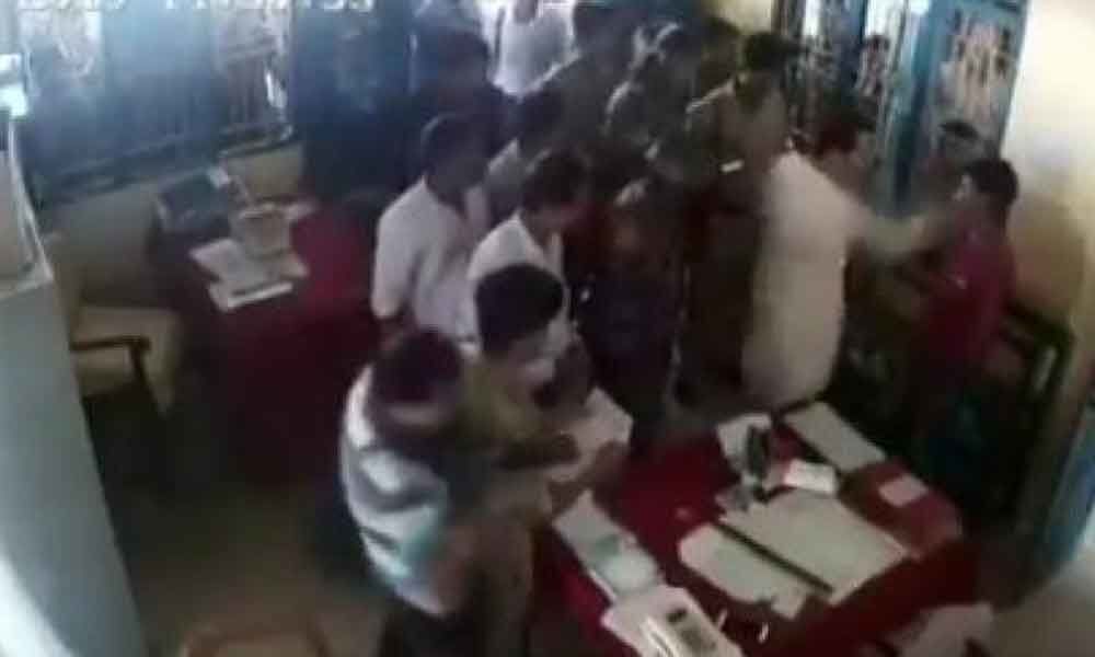 Watch: Tripura Congress chief booked for slapping man in police station