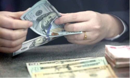 US dollar falls amid rising British pound