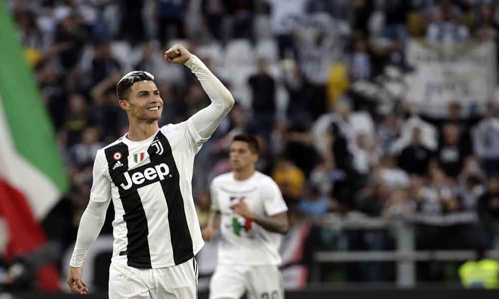 Juventus clinch their eight consecutive Seria A title as Ronaldo creates history