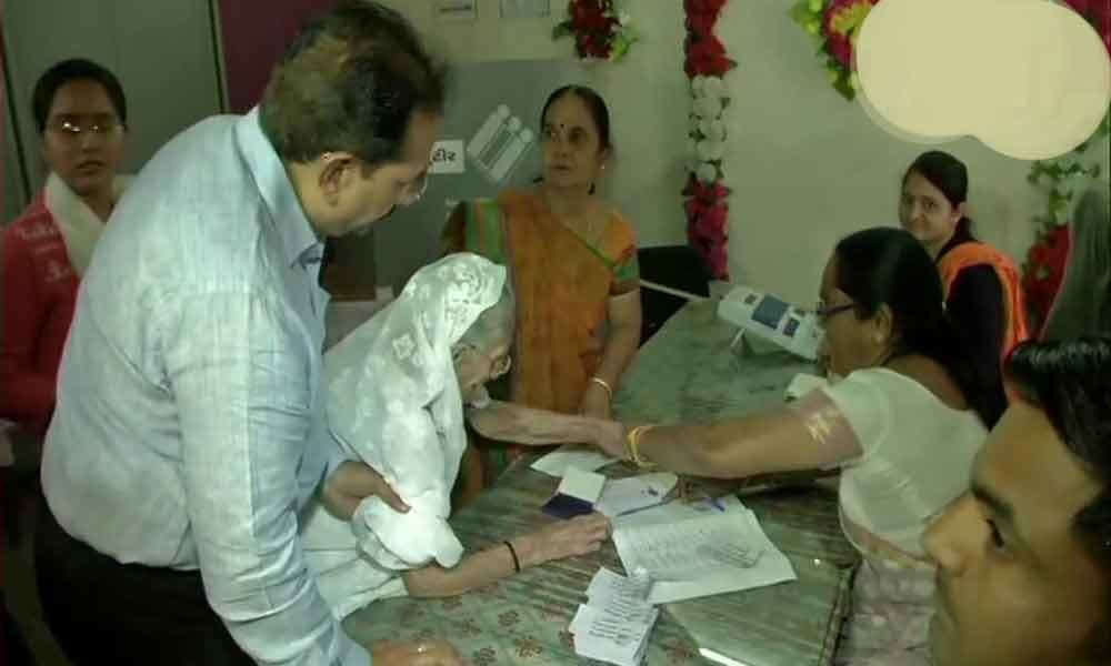 PM Narendra Modis mother casts vote in Ahmedabad