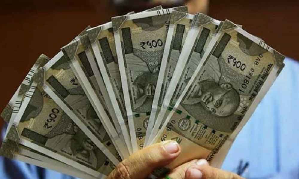Rupee tumbles 22 paise against dollar on crude concerns