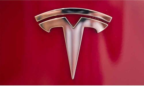 Teslas Musk sees merit in capital raise, vows profit in Q3 after large loss