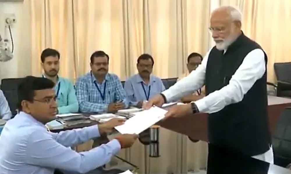 Modi files nomination in Varanasi, shows off NDA strength