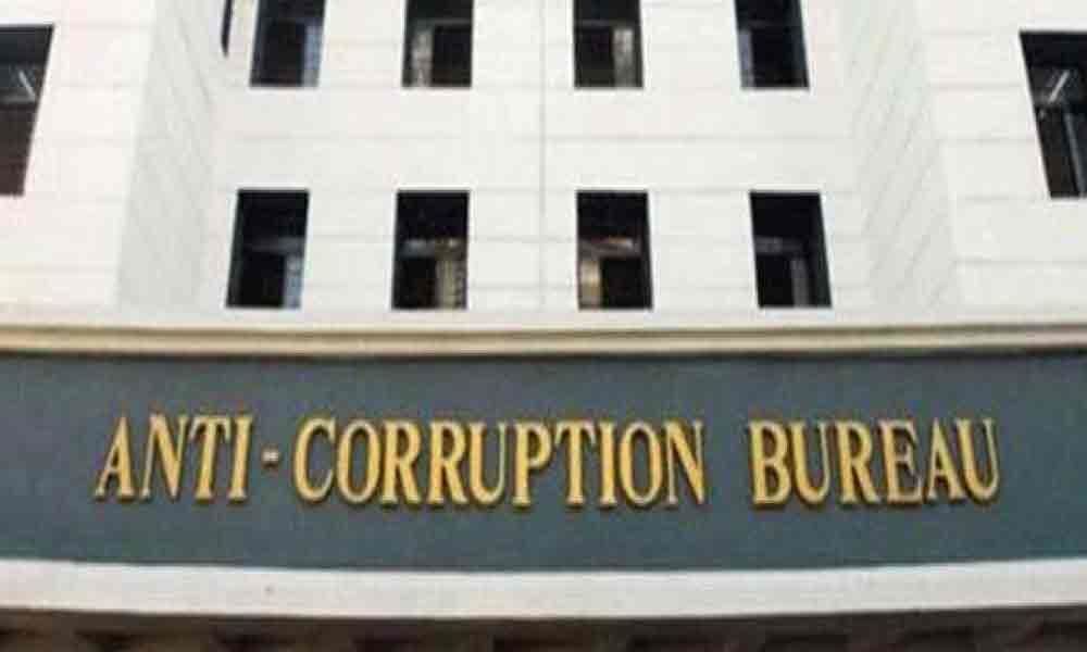 ACB nabs two mandal level officials for graft