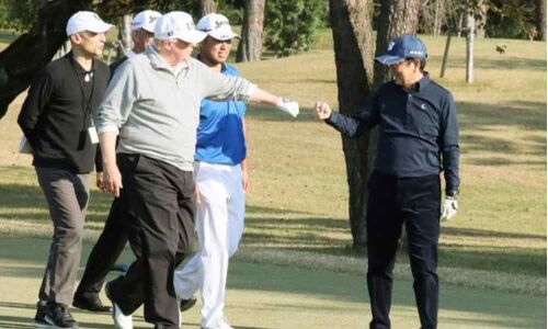 In midst of trade talks, Donald Trump takes Shinzo Abe for golf rematch