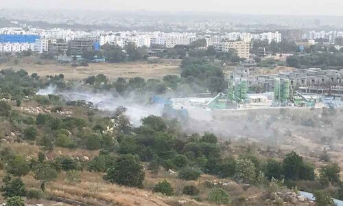 Garbage burning choking Puppalguda