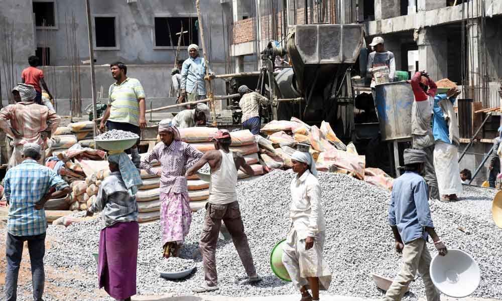 Labour Day celebrations not significant for labourers at a construction ...