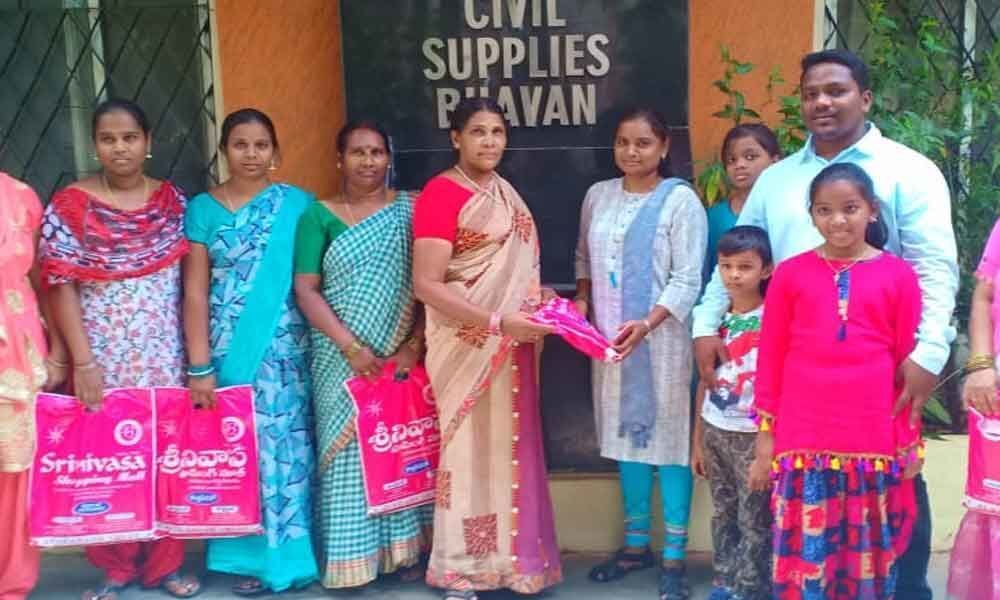Sarees distributed to poor women workers