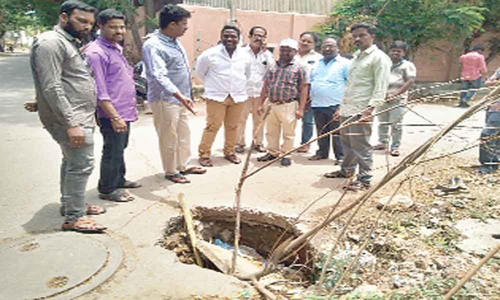 GHMC to slap notices for throwing waste in manholes