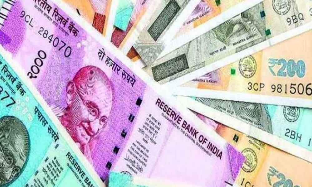 Rupee rises 13 paise to 69.24 vs USD in early trade