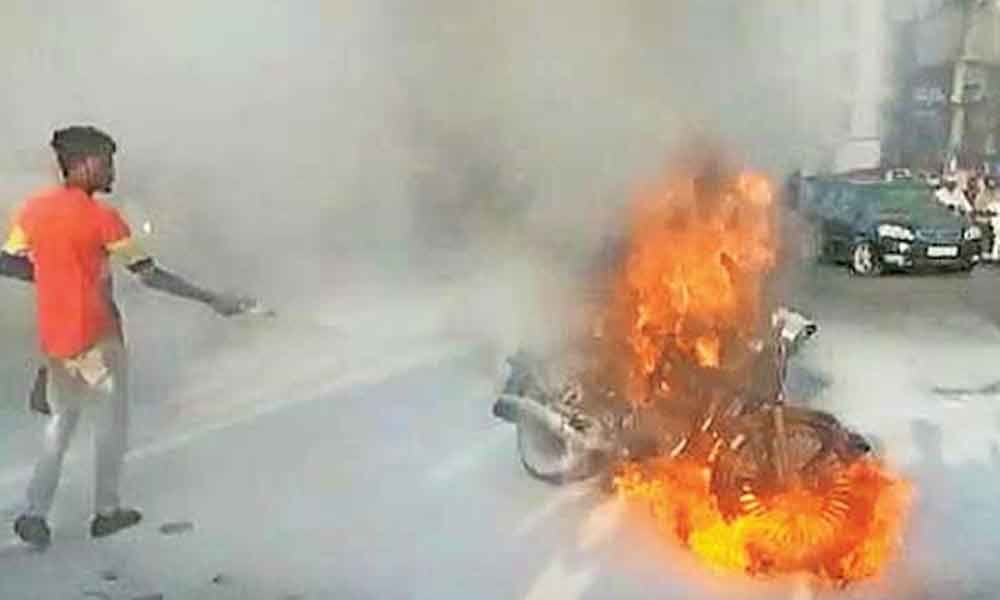 Moving bike catches fire in Hyderabad