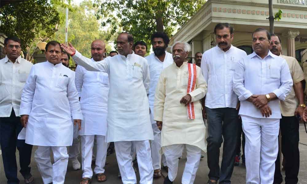TRS govt hand in glove with MIM, charges BJP