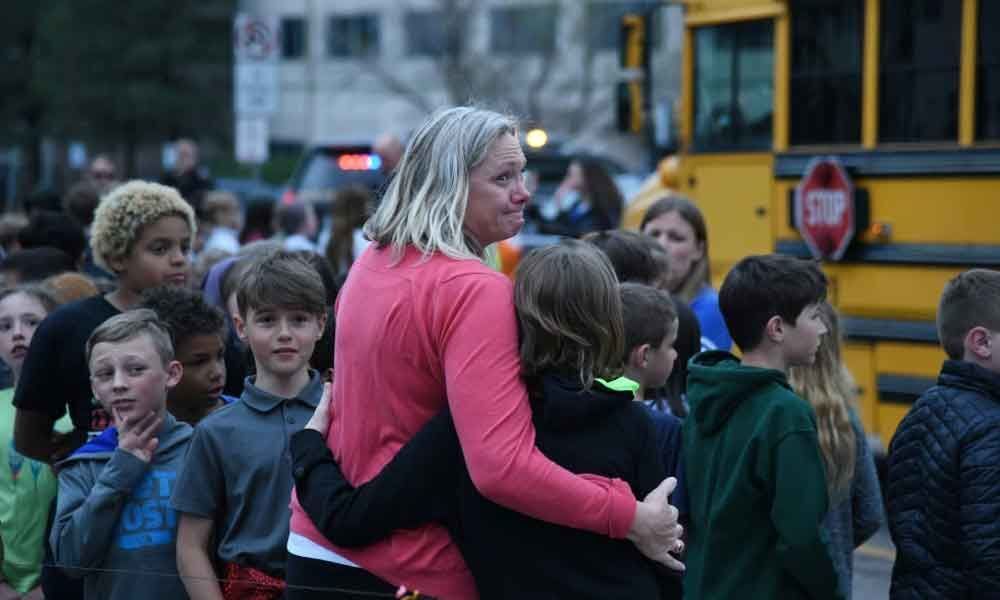 2 suspects in custody as 1 killed, 7 injured in Colorado school shooting