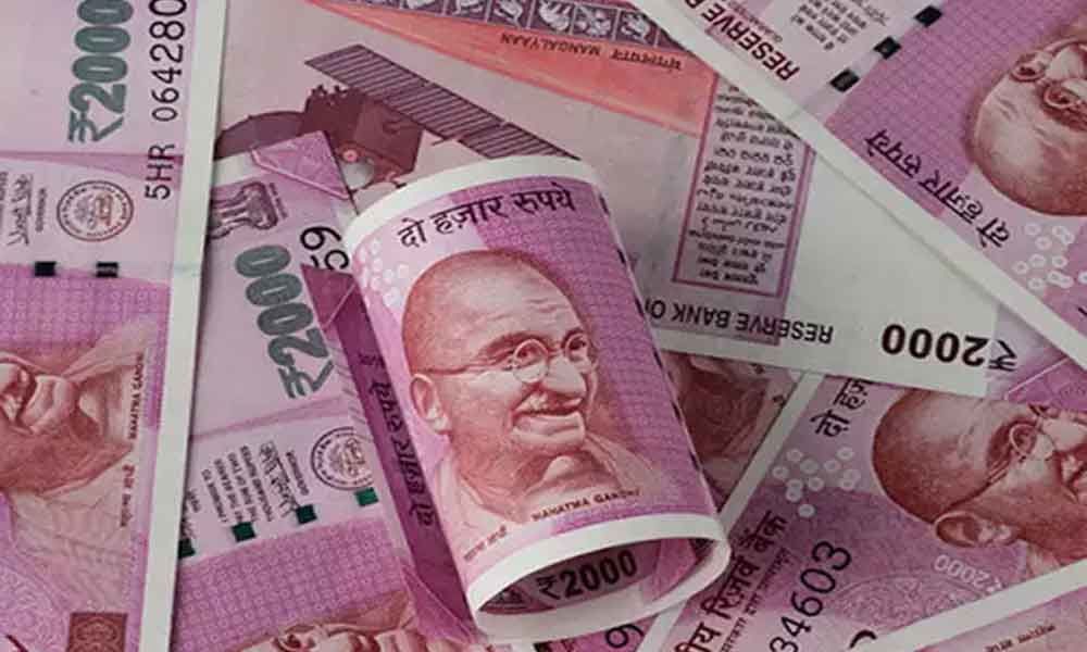Rupee skids 18 paise to 69.89 vs USD in early trade