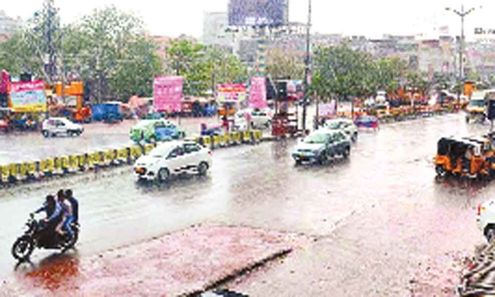 Light rains bring relief from heat