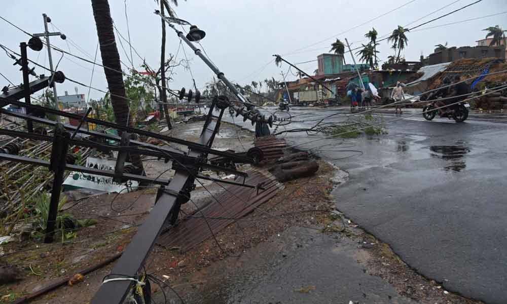Telangana energy staff restores power in Odishas cyclone hit areas