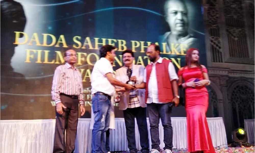 Filmmaker Abhik Bhanus book Stool Piegon bags Dada Saheb Phalke book of the year award