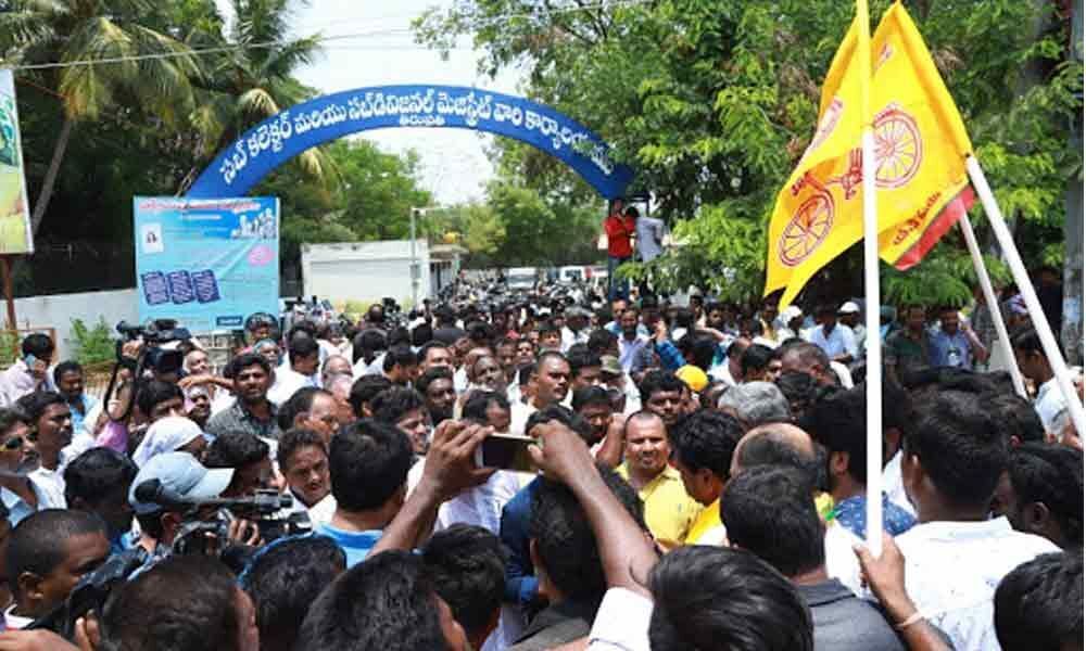 TDP held massive dharna protesting EC decision on repoll