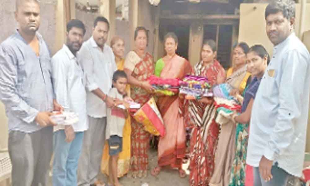 TRS leaders provide relief to owner of burnt house