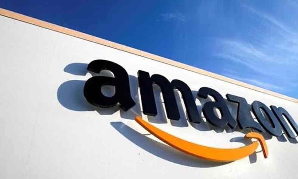 1 lakh Indian traders sell products online: Amazon JV