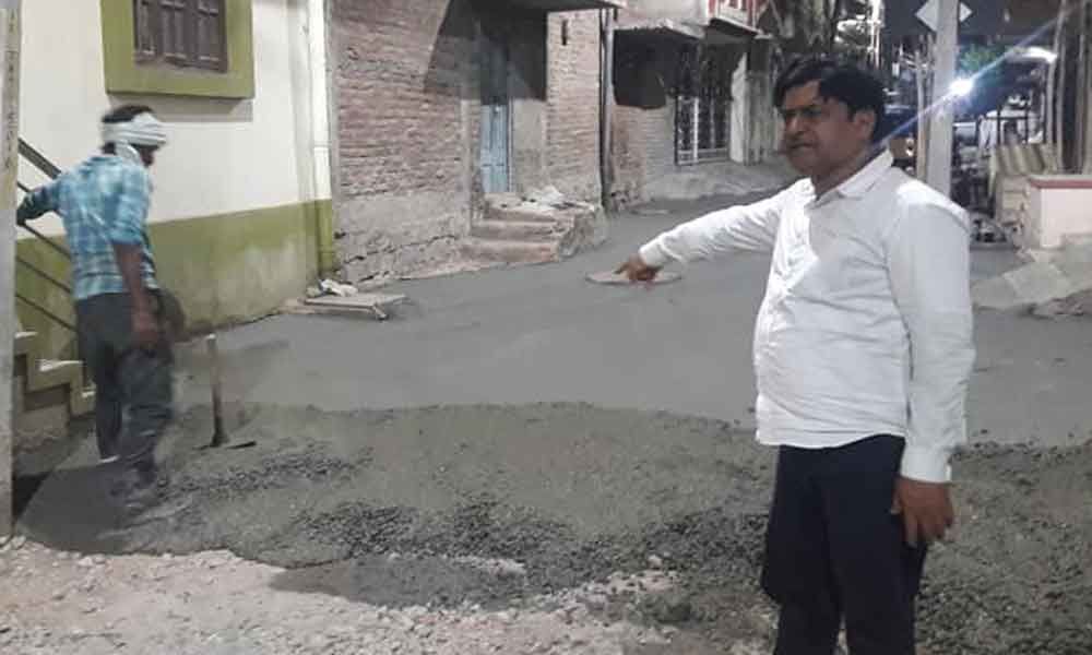 Corporator Mirza Saleem Baig inspects CC road works