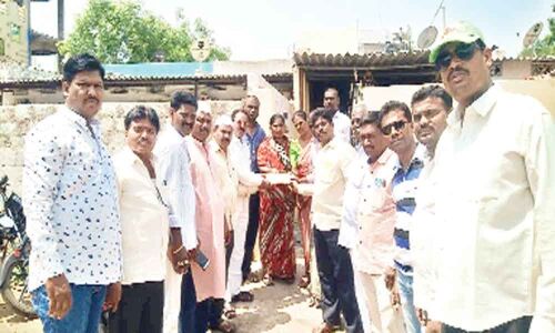 Youth Congress activists gesture to distressed