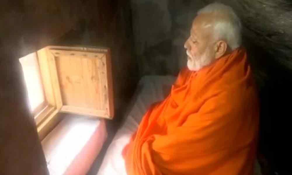 PM meditates inside holy cave