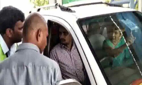 AP minister Pullarao Prathipatis wife argues with toll booth staffer over fee