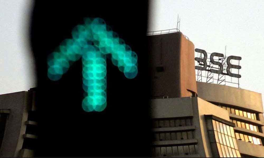 Sensex jumps over 900 points as exit polls suggest NDAs victory
