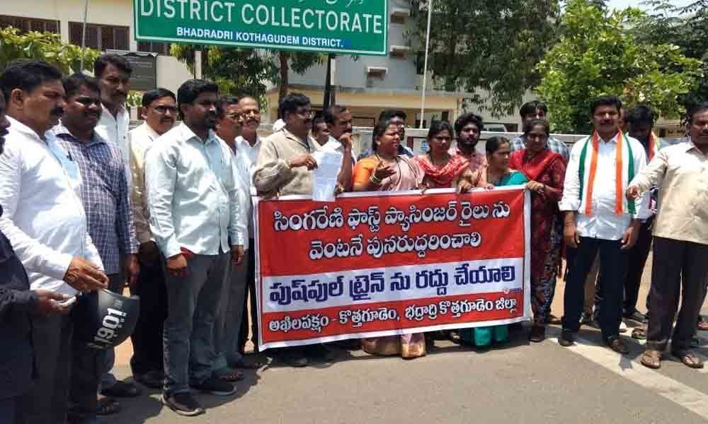 Protest at Collectors office seeking restoration of Singareni train in Kothagudem