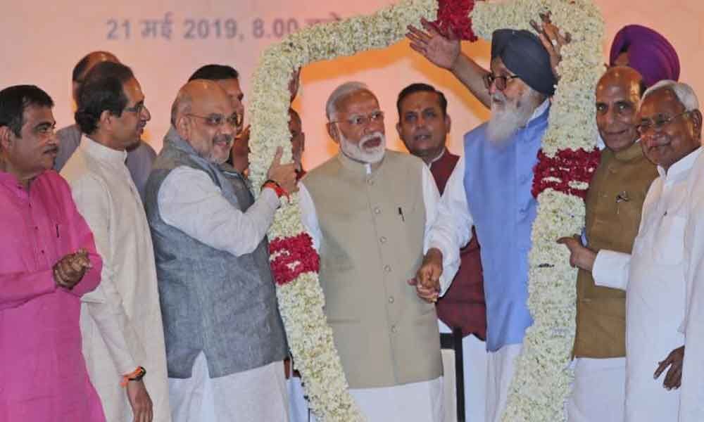 PM expresses concern over needless controversy on EVMs at NDA meeting