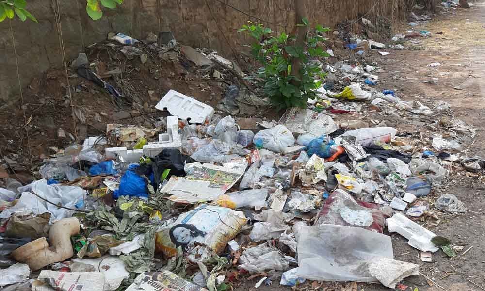 Residents raise a stink over piled up garbage