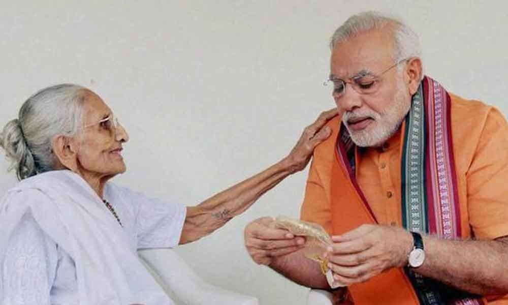 After massive victory, PM Modi to seek mothers blessings in Gujarat tomorrow