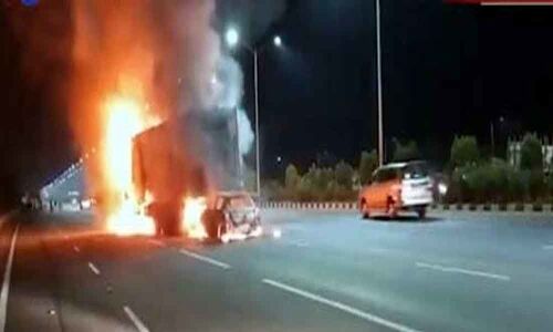 Hyderabad: 1 hurt as car catches fire after colliding with container on ORR Hyderabad: 1 hurt as car catches fire after colliding with container on ORR