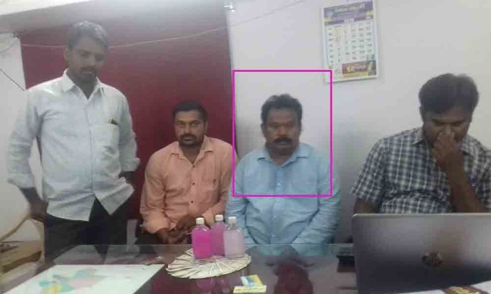 ACB nets Huzurnagar municipal official