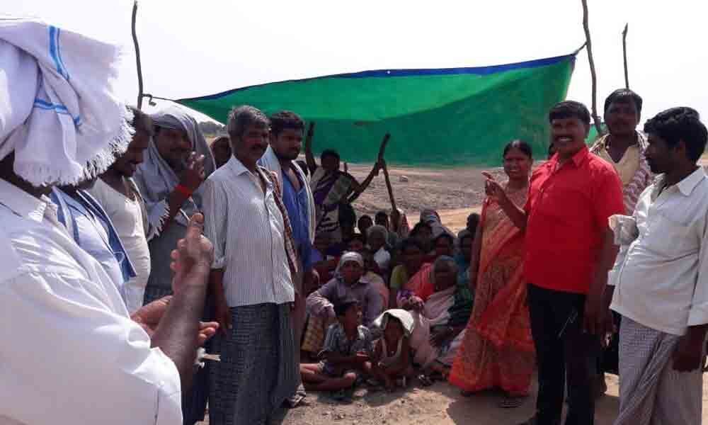 MGNREGA workers stage protest seeking pending wages facilities at workplace in Wanaparthy
