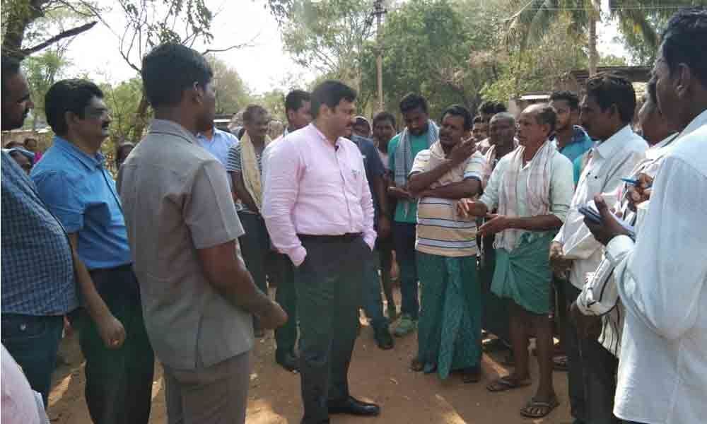 Collector Rajat Kumar Saini visits tribal hamlets, inspects land purification works in Kothagudem
