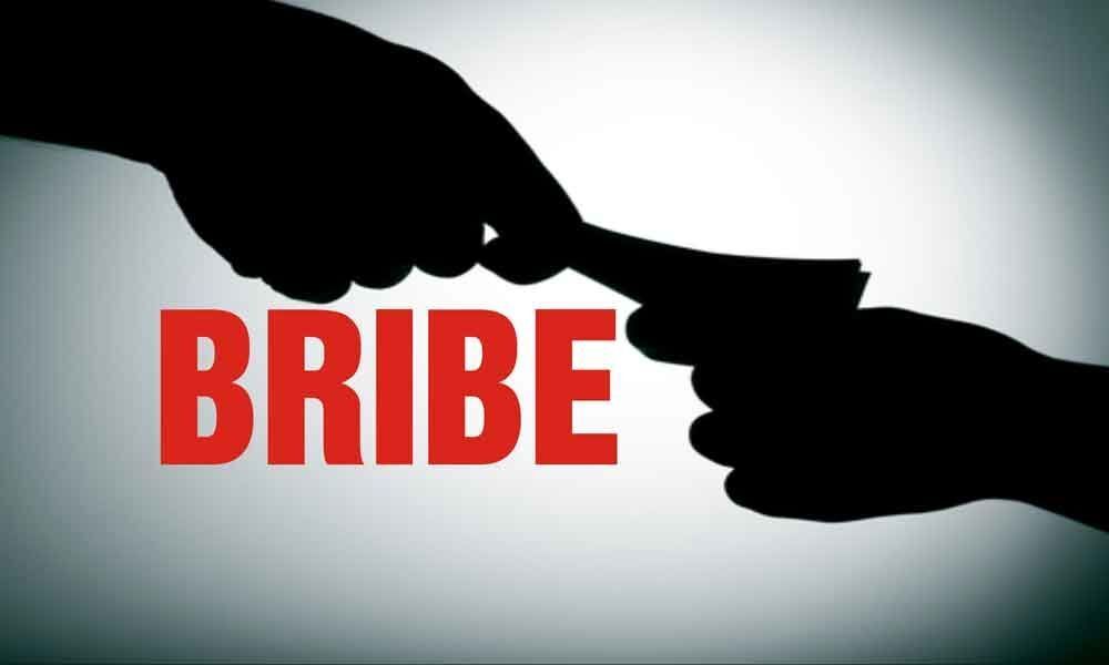 VRO caught by ACB while taking bribe in Mahabubabad