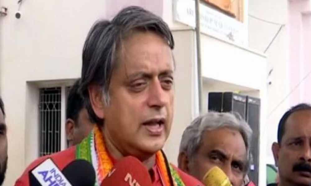 Delhi court allows Tharoor to travel abroad